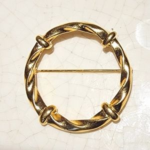 Vintage nautical or medieval gold twisted station circle brooch